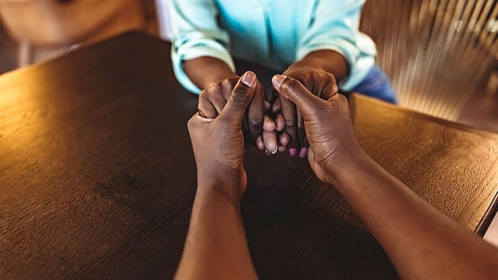 Two people praying