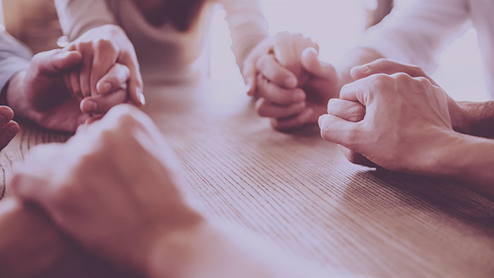 Hands held together in prayer